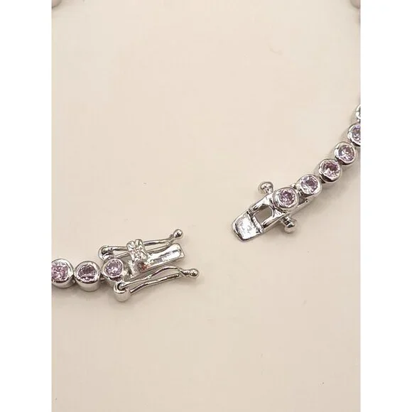 Silver Tone Tennis Bracelet With Pink CZ Stones & Secure Clasp - Picture 11 of 11